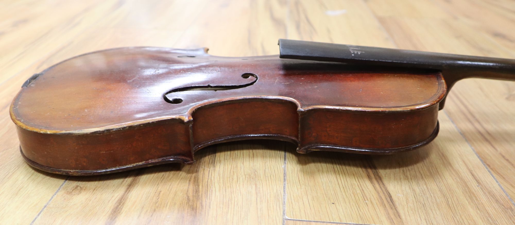 A 19th century German violin, length of back 35.5cm, cased